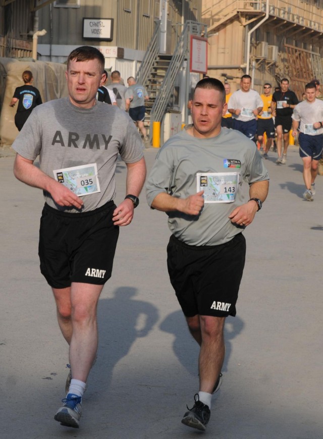 Mentors invite Afghan National Army soldiers to participate in Army Ten-Miler shadow run