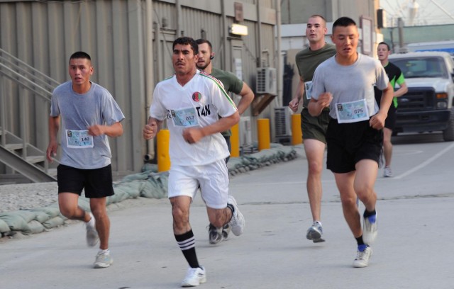 Mentors invite Afghan National Army soldiers to participate in Army Ten-Miler shadow run