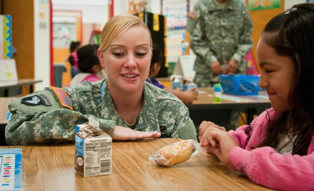 SAMC Soldiers walk children to school, promote safety