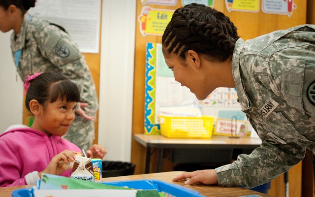 SAMC Soldiers walk children to school, promote safety