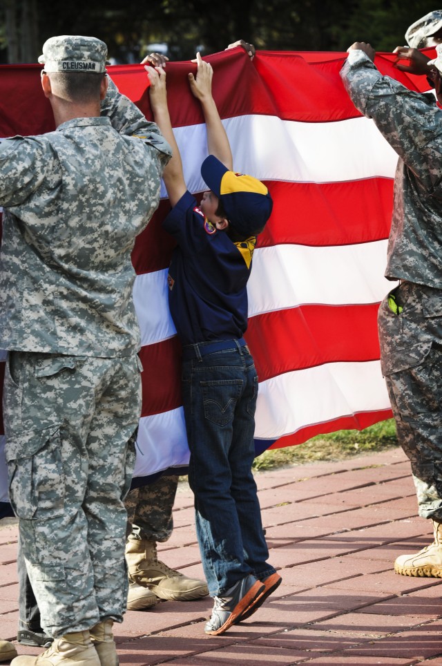 Local Cub Scouts observe, participate in 'Retreat' ceremony