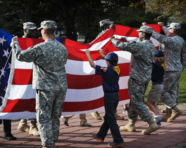 Local Cub Scouts observe, participate in 'Retreat' ceremony