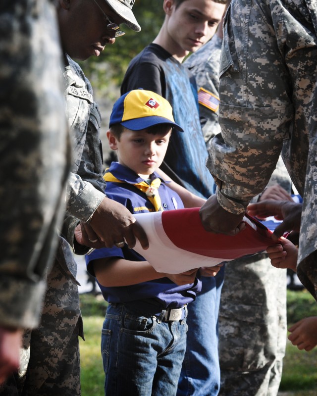 Local Cub Scouts observe, participate in 'Retreat' ceremony