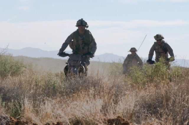 Iron Brigade soldiers combine dirt bikes, ATVs with tanks
