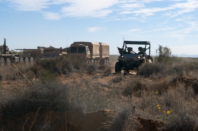 Iron Brigade soldiers combine dirt bikes, ATVs with tanks