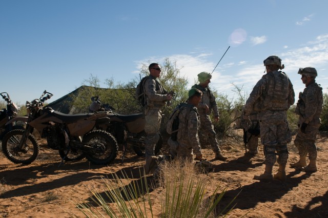 Iron Brigade soldiers combine dirt bikes, ATVs with tanks
