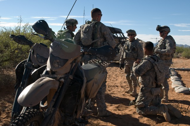 Iron Brigade soldiers combine dirt bikes, ATVs with tanks