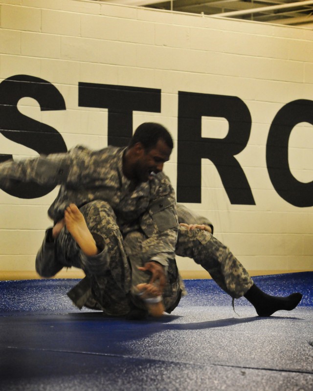 ASC Soldiers roll out mats to roll up the enemy