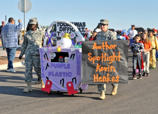 402nd FA Soldiers march in adopted school's Halloween Parade