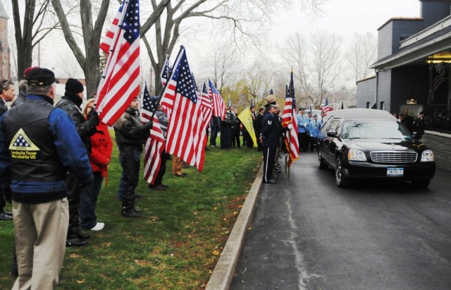 Military supporters wave flags