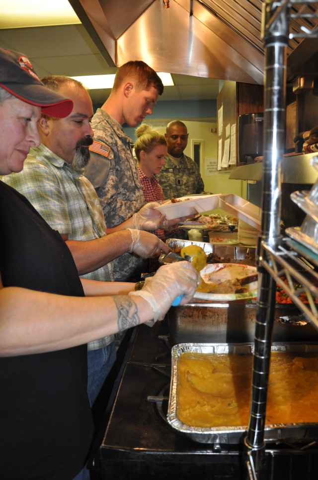 Natick Soldiers, employees help soup kitchen