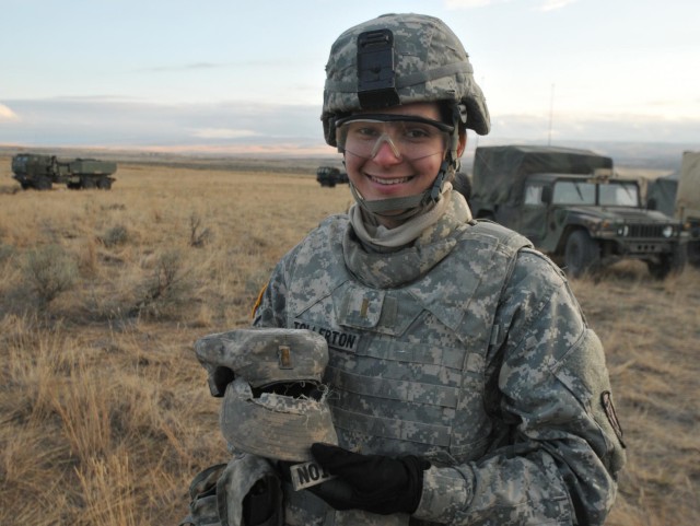 Fitting in: One soldier loses hat to join unit