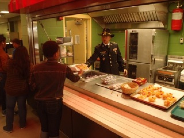 Soldier serving a Thanksgiving meal