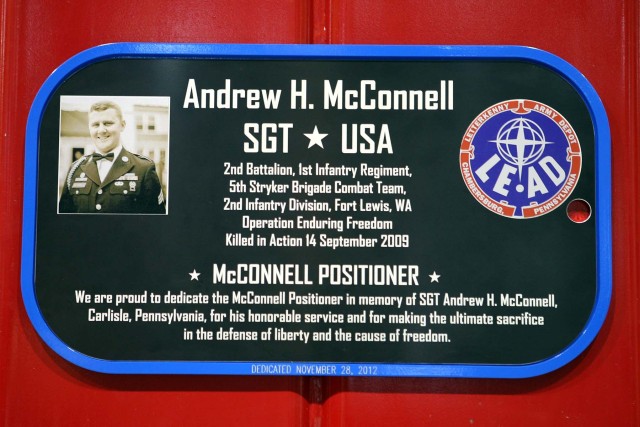 Sgt. Andrew McConnell plaque is mounted on RCV welding positioner