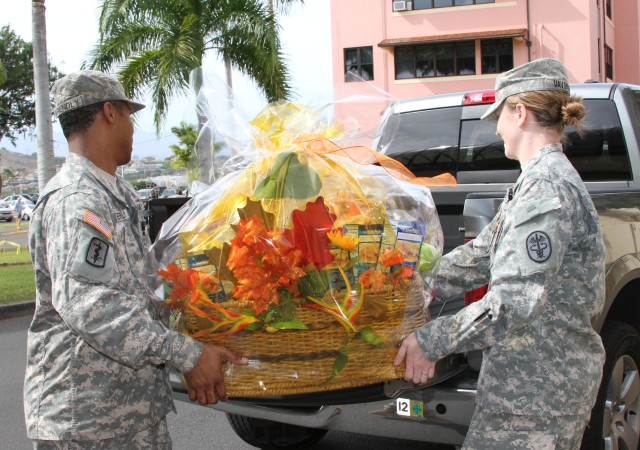 Tripler JOC spreads holiday cheer, provides Thanksgiving fixings to local families