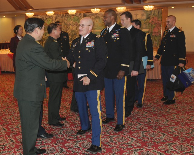 PLA and US DME delegation greet each other at luncheon
