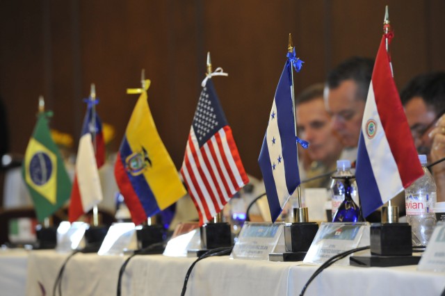 Flags on table at Conference of the American Armies