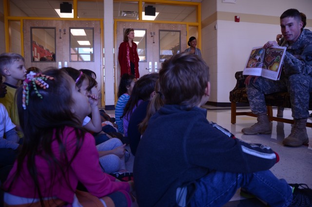 Soldiers read to students