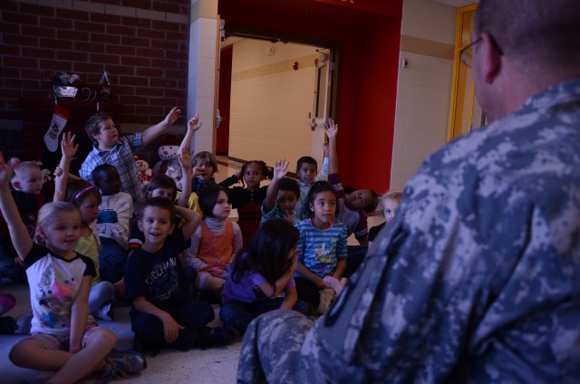 Soldiers read to students