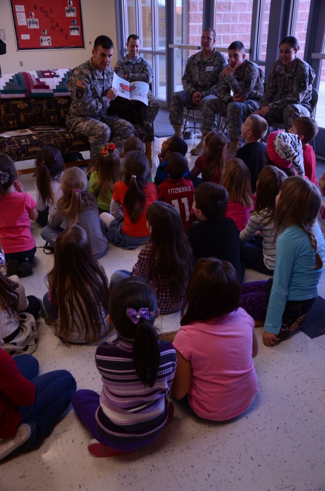 Soldiers read to students