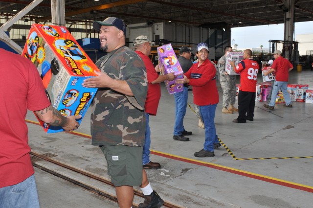 Corpus Christi Army Depot employees team up to get toys to children.