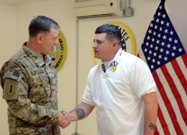 Injured contractor receives medal