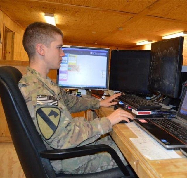 Long Knife soldier watches birth via Skype
