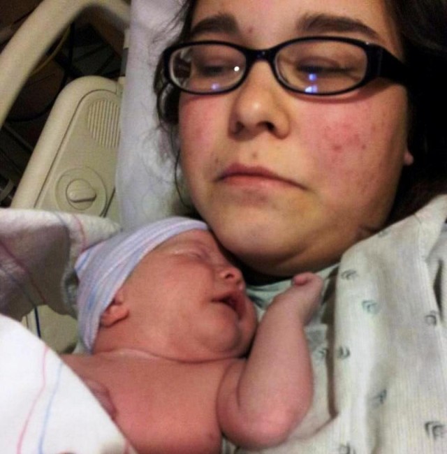Long Knife soldier watches birth via Skype