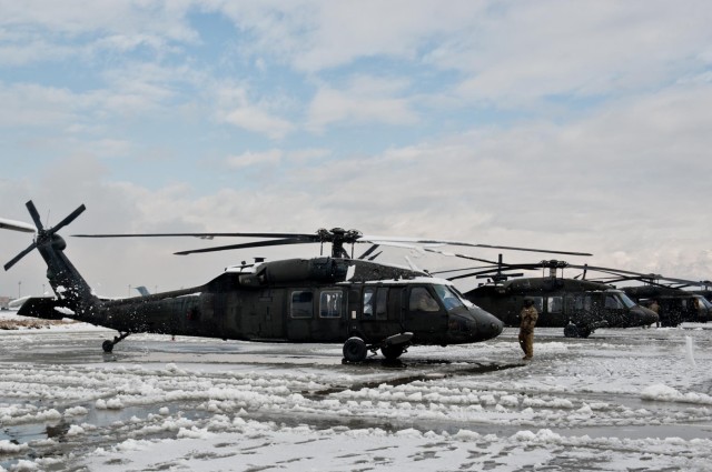 Wings of Destiny clean up after snow storm
