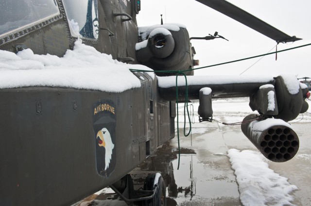 Wings of Destiny clean up after snow storm