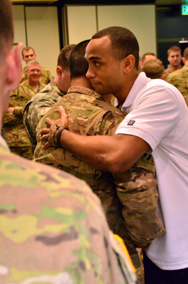 Months-long wait ends for infantryman reunited with comrades