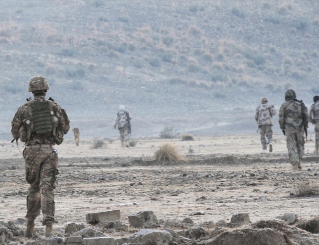 Partnered with Rakkasans, Afghan police patrol border
