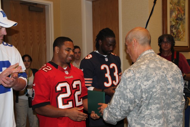 NFL stars visit Hawaii's wounded warriors, Purple Heart recipients