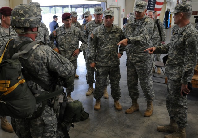 Paratrooper demonstrates equipment for senior leadership