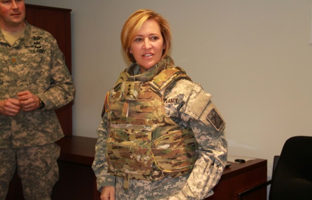 Surgeon general tries on the new tactical vest