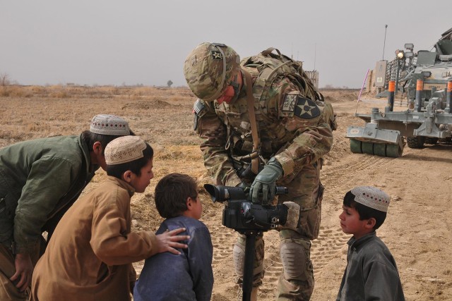 CTF 4-2 broadcaster coaches local Afghan children