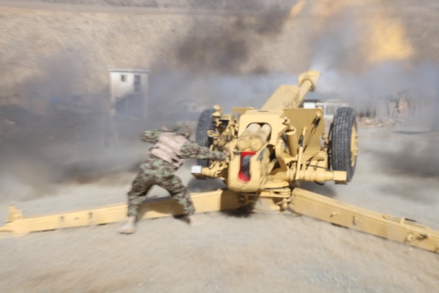 Afghan soldier fires D-30