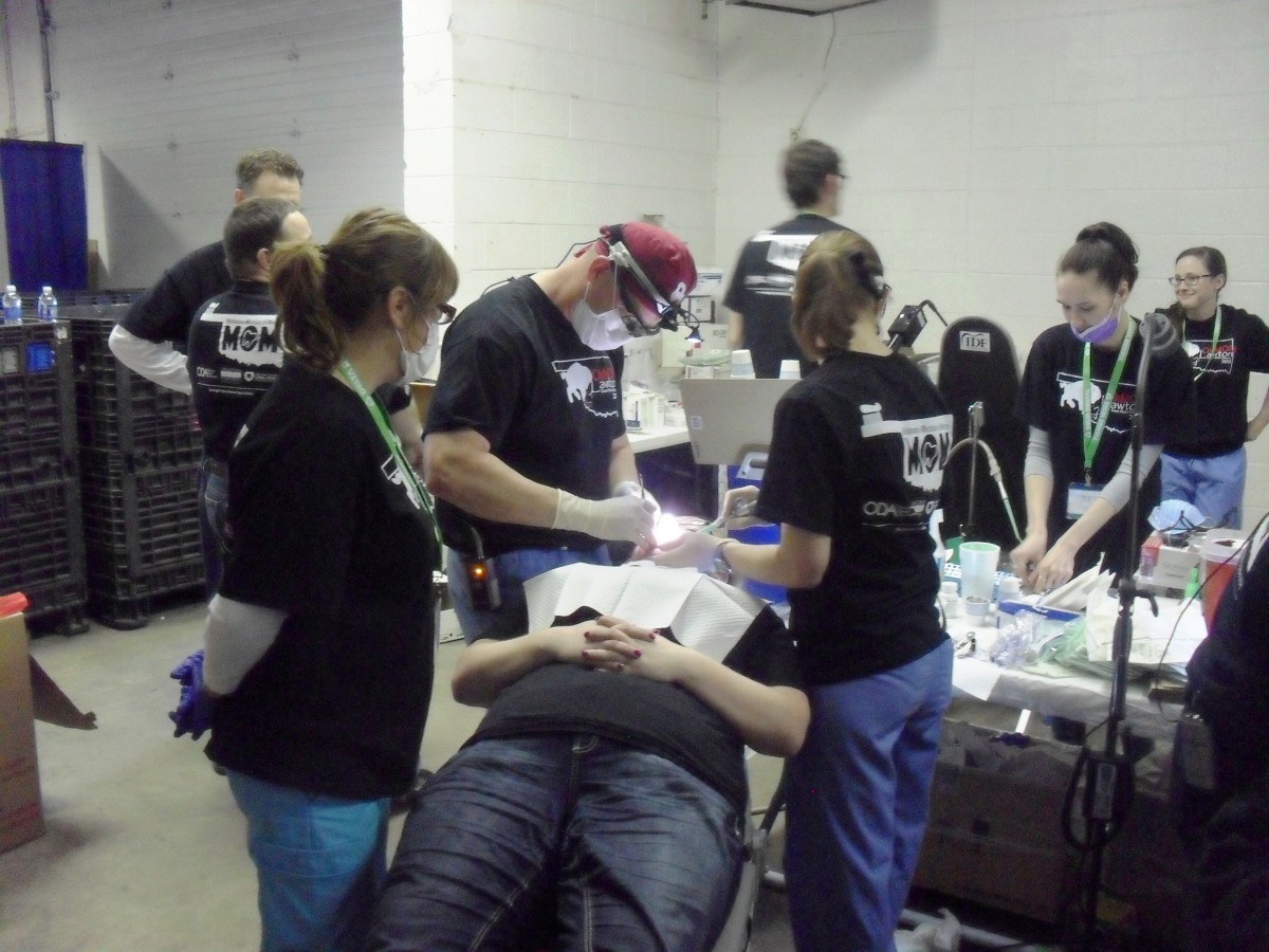 Sill dental personnel volunteer at massive free clinic Article The