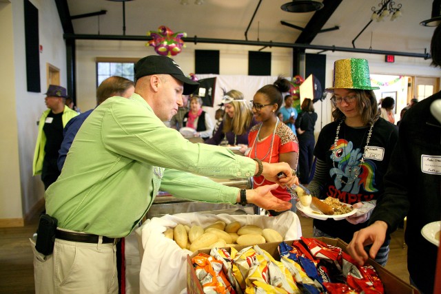 Mentors provide special attention to children of the fallen, Mardis Gras style