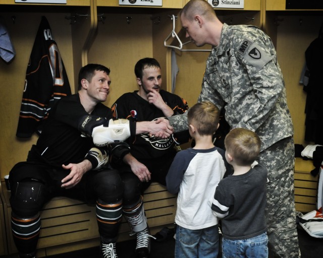 ASC Soldier drops puck at Military Appreciation Night
