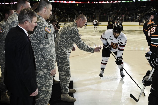 ASC Soldier drops puck at Military Appreciation Night
