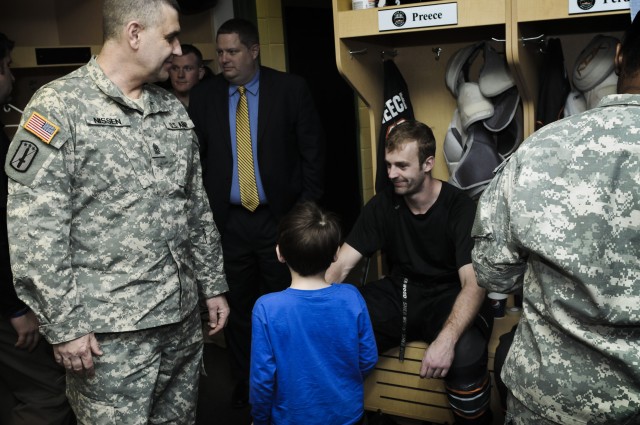 ASC Soldier drops puck at Military Appreciation Night