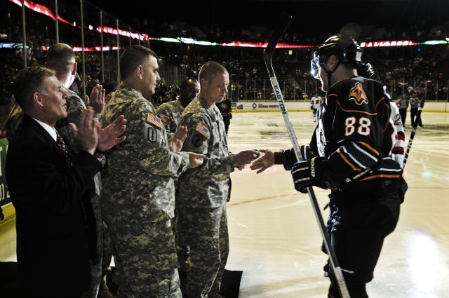 ASC Soldier drops puck at Military Appreciation Night