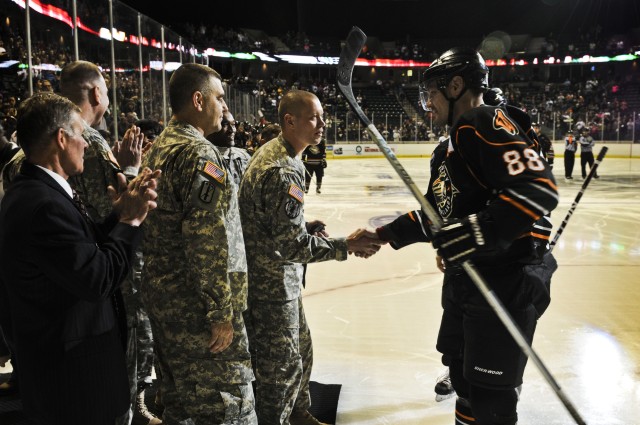 ASC Soldier drops puck at Military Appreciation Night