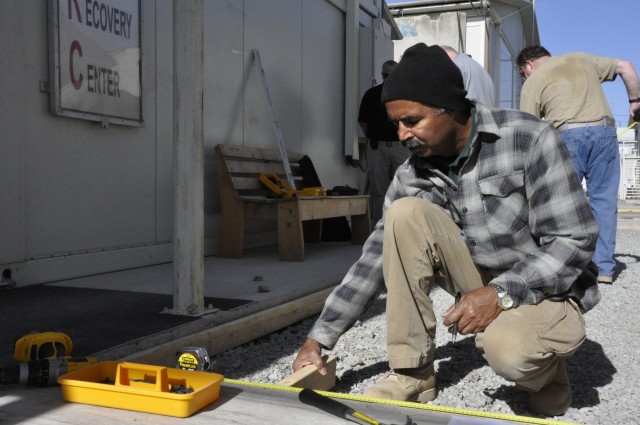 USACE volunteers build walkway; make moving around easier for Wounded Warriors at KAF