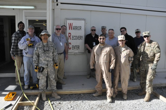 USACE volunteers build walkway; make moving around easier for Wounded Warriors at KAF