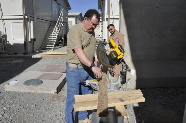 USACE volunteers build walkway; make moving around easier for Wounded Warriors at KAF