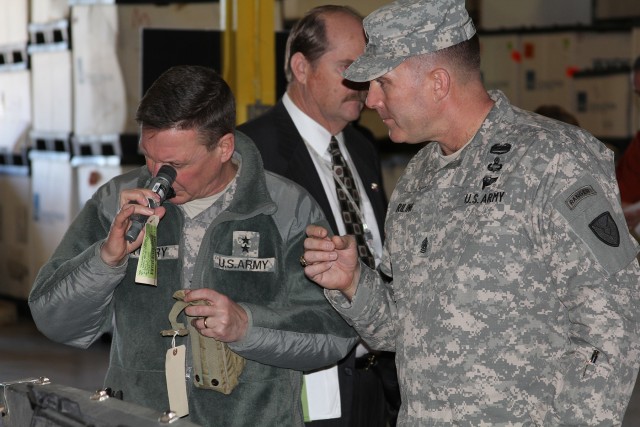 Maj. Gen. Terry and Command Sgt. Maj. Riling look at Non-Standard Equipment