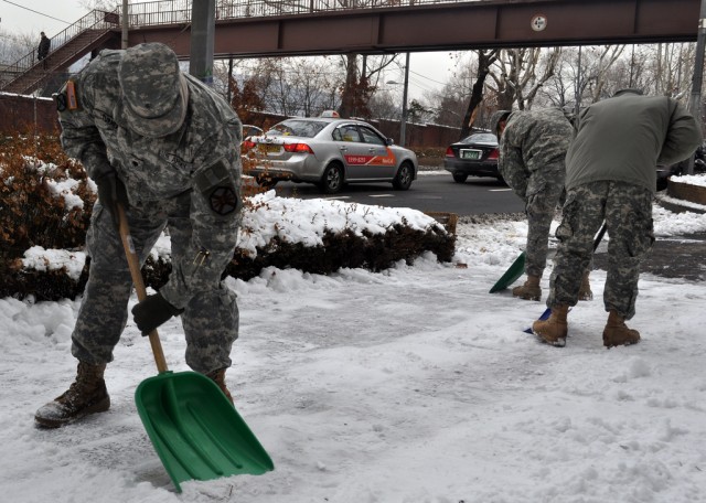Soldiers clear snow for local community