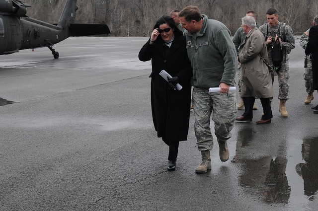 Kentucky's adjutant general, Maj. Gen. Edward W. Tonini walks with Assistant Secretary of the Army Katherine Hammack following an aerial tour of the Wendell H. Ford Regional Training Center